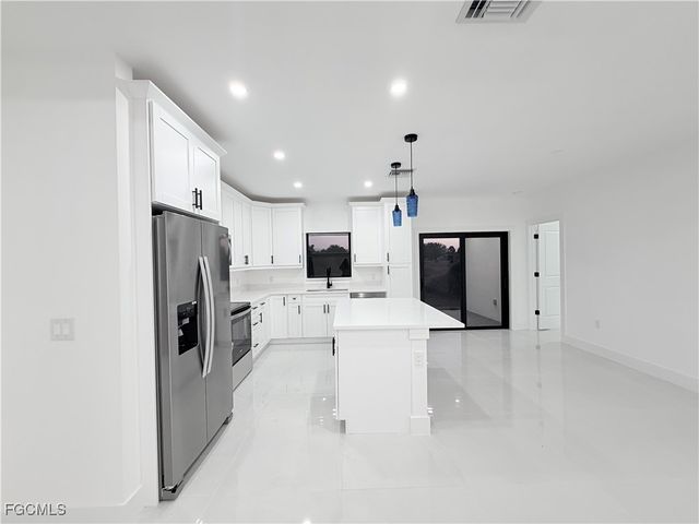 844 Millpond ST E, Lehigh Acres, FL 33974