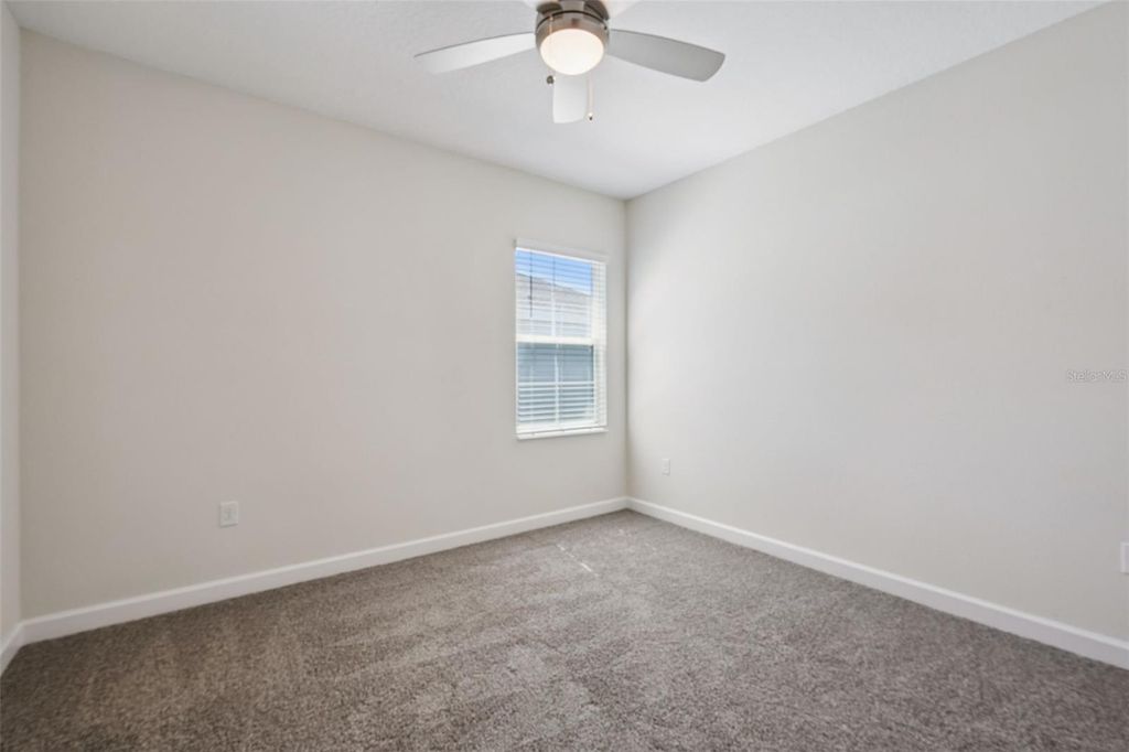 Image 36 of property listing at 12432 TURTLE GRASS DRIVE, Orlando, FL 32824