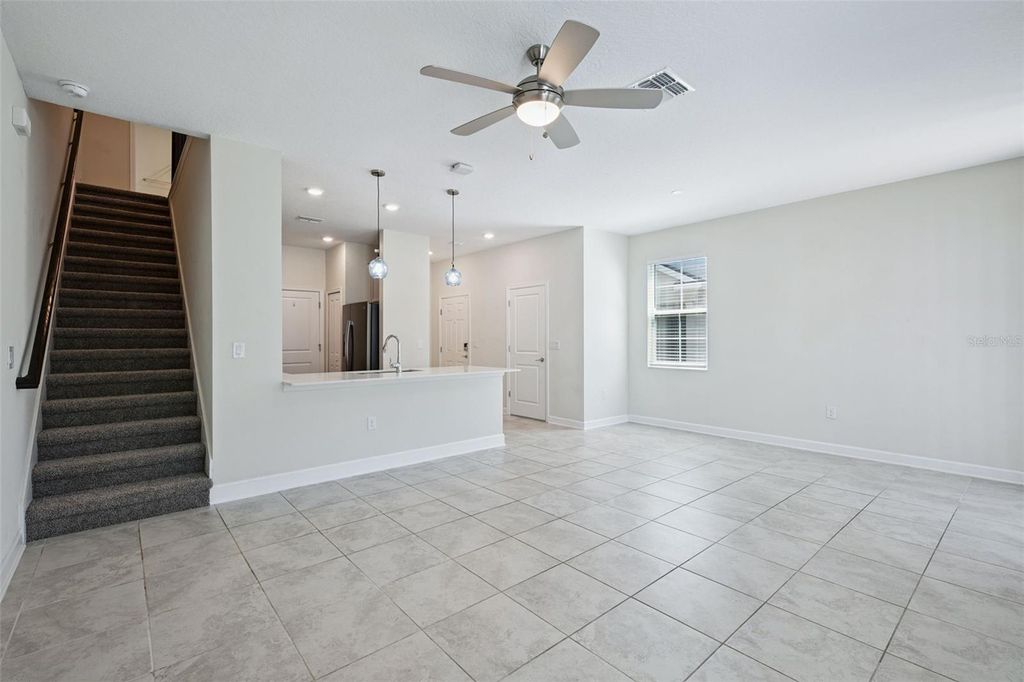 Image 5 of property listing at 12432 TURTLE GRASS DRIVE, Orlando, FL 32824