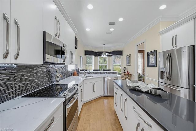 9097 Troon Lakes DR, Naples, FL 34109