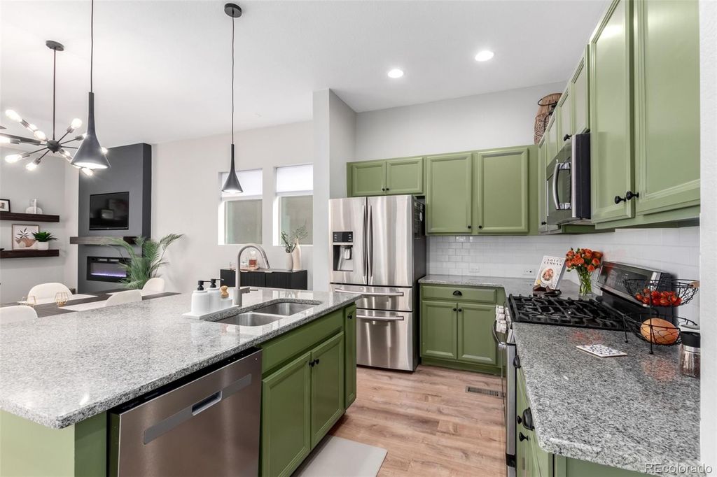Image 9 of property listing at 1440 W 67th Avenue, Denver, CO 80221