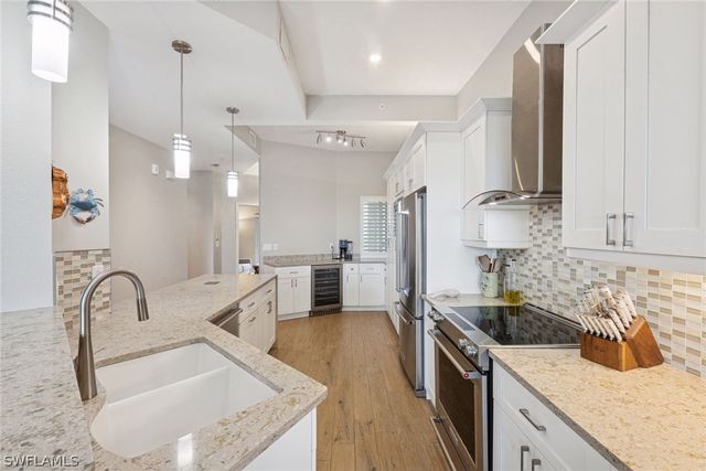 7687 Pebble Creek CIR 403, Naples, FL 34108