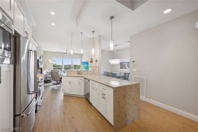 7687 Pebble Creek CIR 403, Naples, FL 34108