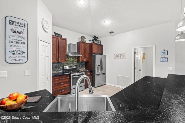 676 Sheridan Woods Drive, Melbourne, FL 32904