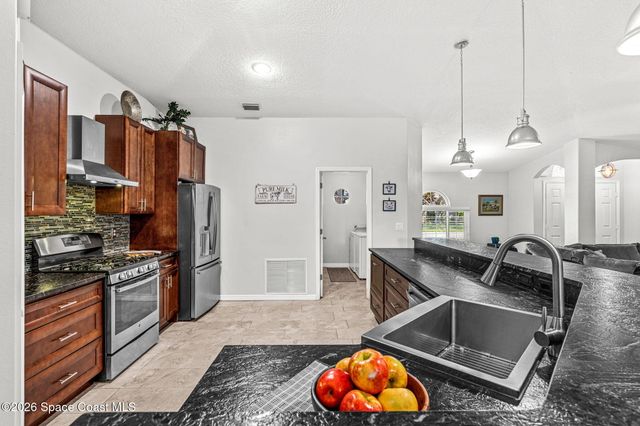 676 Sheridan Woods Drive, Melbourne, FL 32904