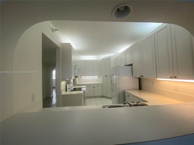 10700 NW 66th St 404, Doral, FL 33178