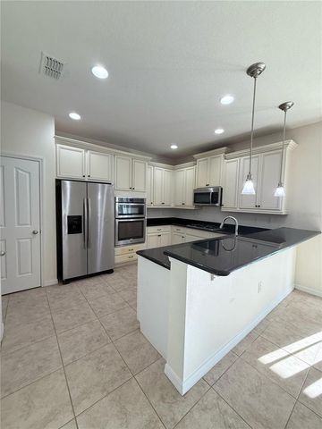 6876 MERRICK LANDING BOULEVARD, Windermere, FL 34786