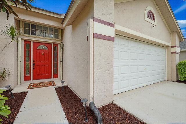 3570 Woods Walk Boulevard, Lake Worth, FL 33467