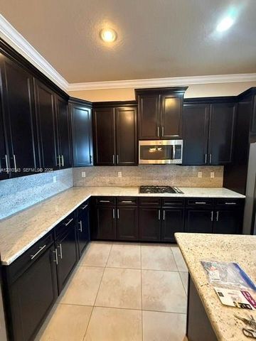 9751 Lakeview Ln, Parkland, FL 33076