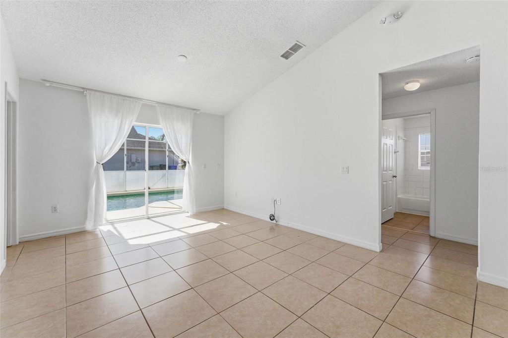 Image 9 of property listing at 1043 SOARING EAGLE LANE, Kissimmee, FL 34746