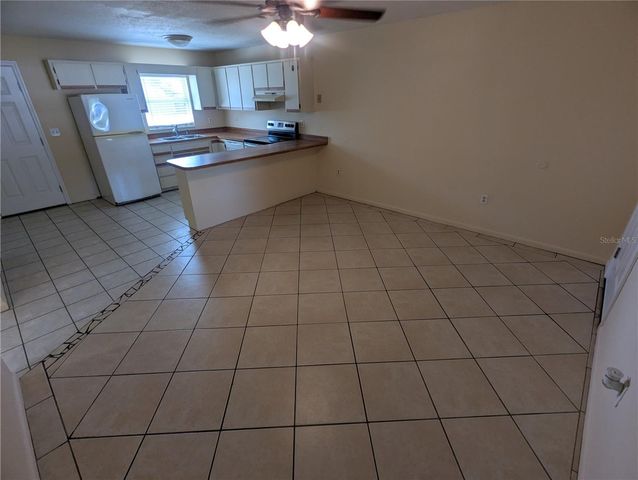824 N SAINT CLAIR ABRAMS AVENUE, Tavares, FL 32778