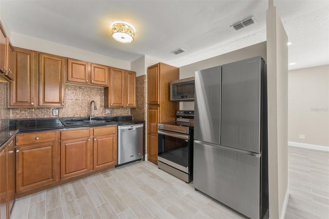 7727 PERUGIA AVENUE, Orlando, FL 32819