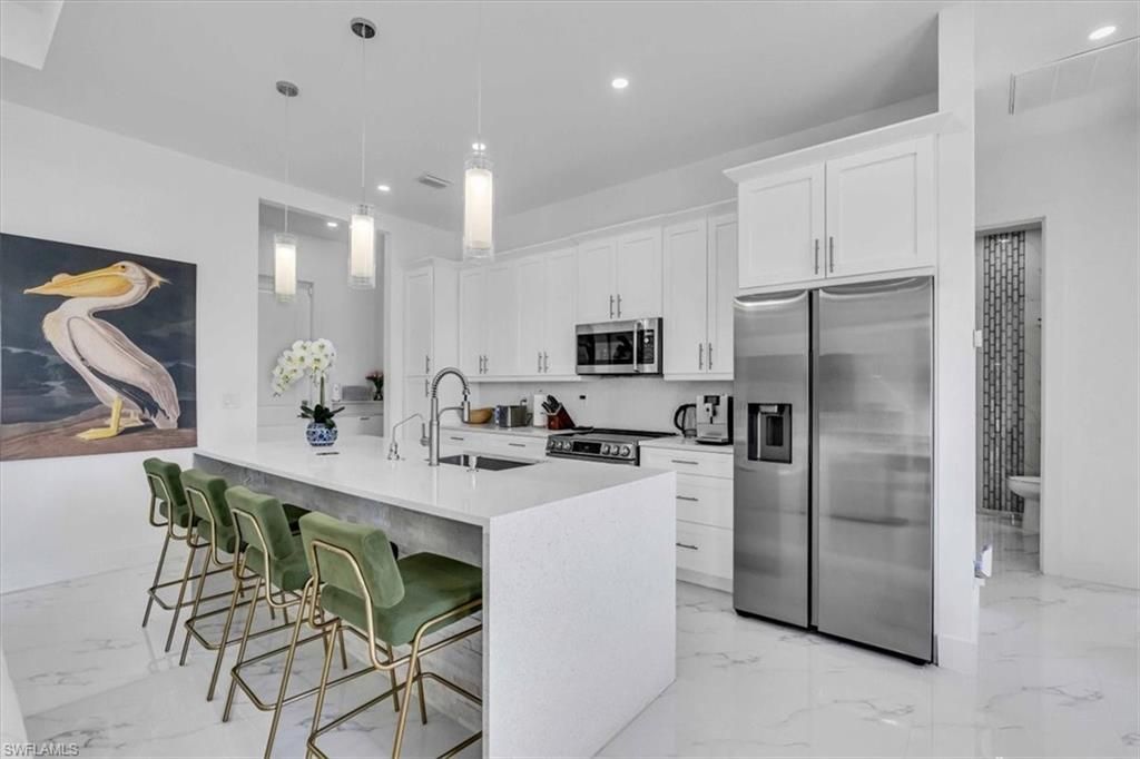 Image 13 of property listing at 116 SE 5th PL, Cape Coral, FL 33990