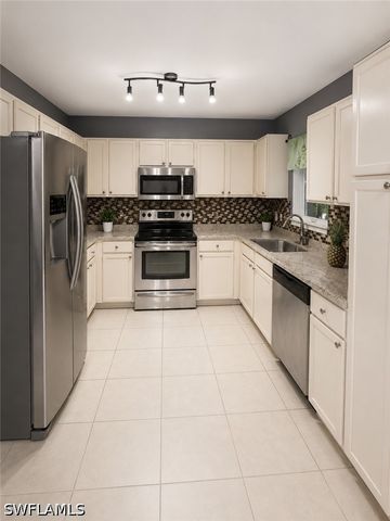 2049 50th ST SW, Naples, FL 34116
