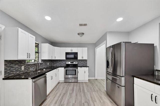 663 County Road 347 S, Cleveland, TX 77327