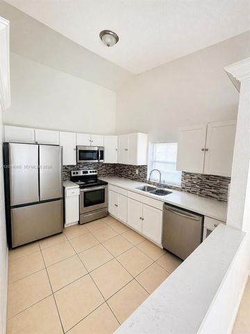10559 La Placida Dr, Coral Springs, FL 33065