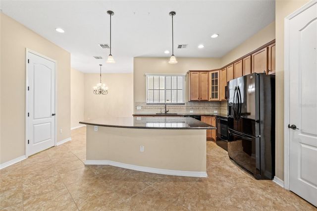 1516 RESOLUTE STREET, Kissimmee, FL 34747