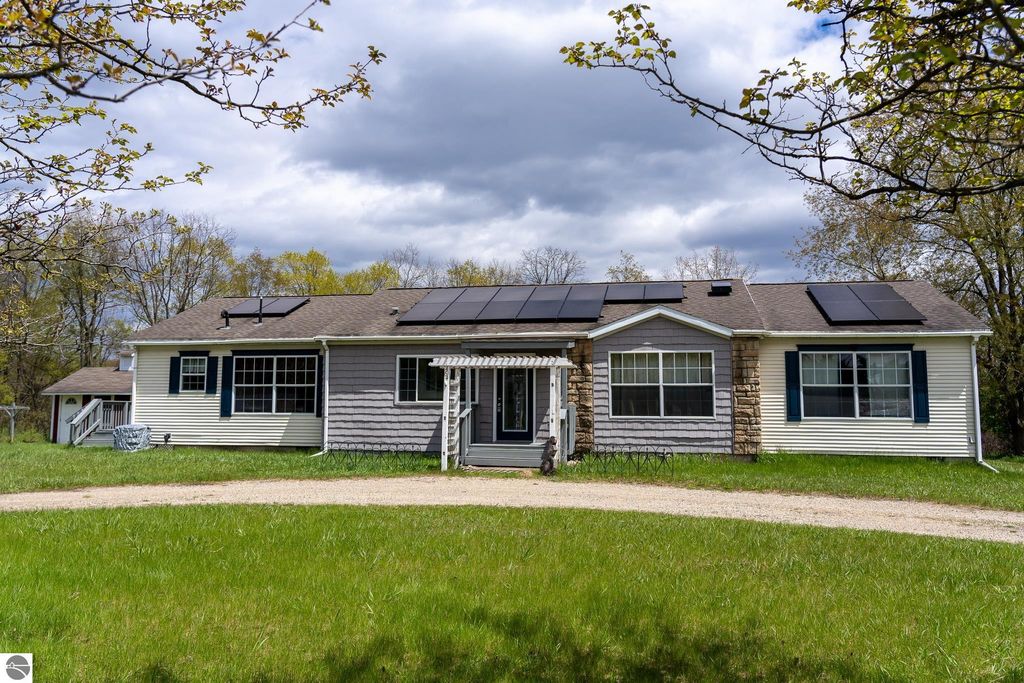 Image 1 of property listing at 464 N Rolland Road, Weidman, MI 48893
