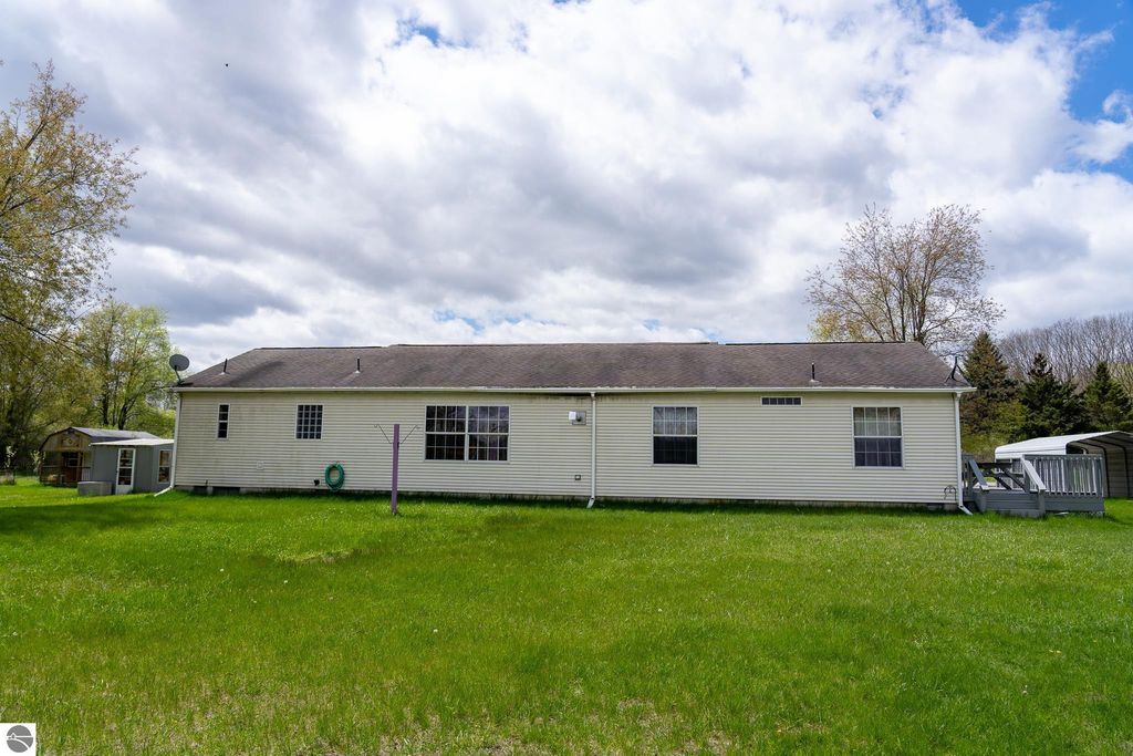 Image 10 of property listing at 464 N Rolland Road, Weidman, MI 48893