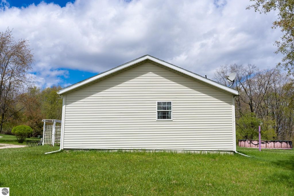 Image 13 of property listing at 464 N Rolland Road, Weidman, MI 48893