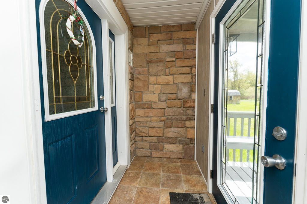 Image 15 of property listing at 464 N Rolland Road, Weidman, MI 48893