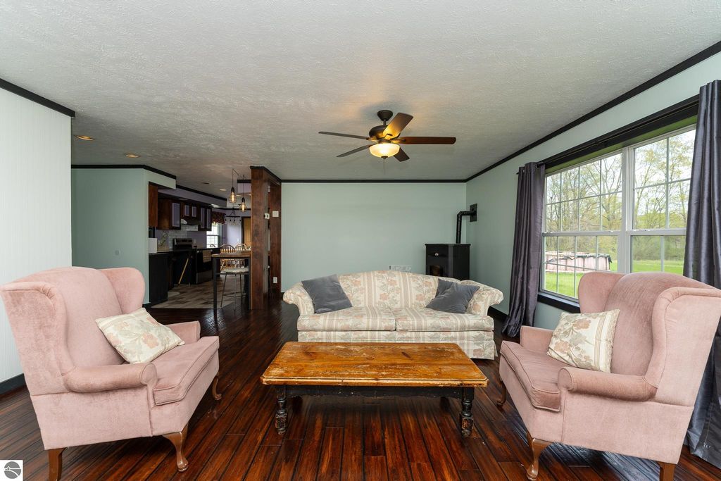 Image 21 of property listing at 464 N Rolland Road, Weidman, MI 48893