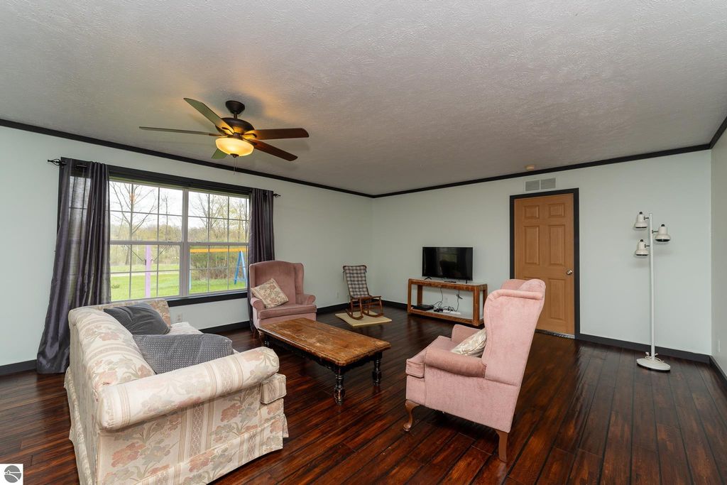Image 22 of property listing at 464 N Rolland Road, Weidman, MI 48893
