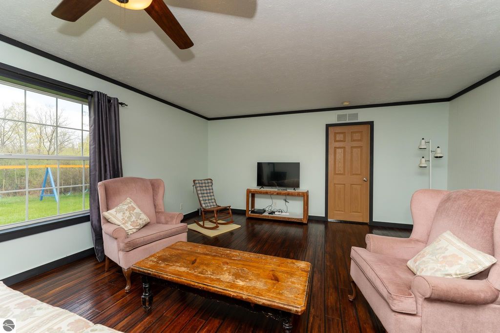 Image 23 of property listing at 464 N Rolland Road, Weidman, MI 48893
