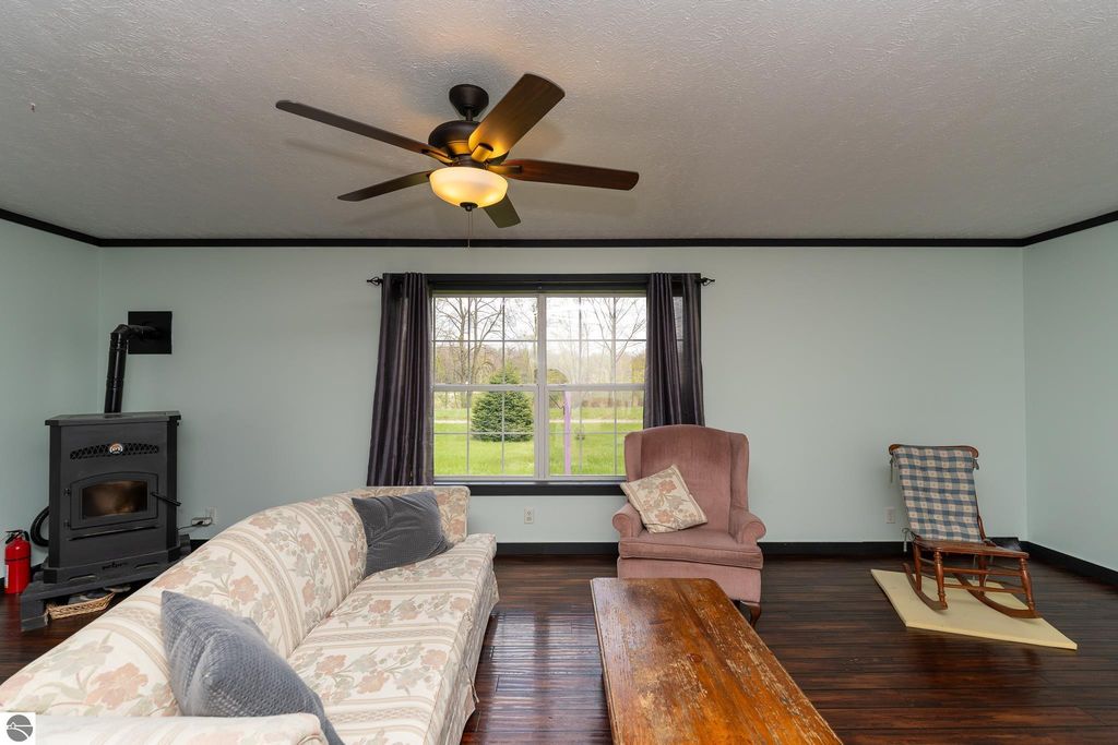 Image 24 of property listing at 464 N Rolland Road, Weidman, MI 48893