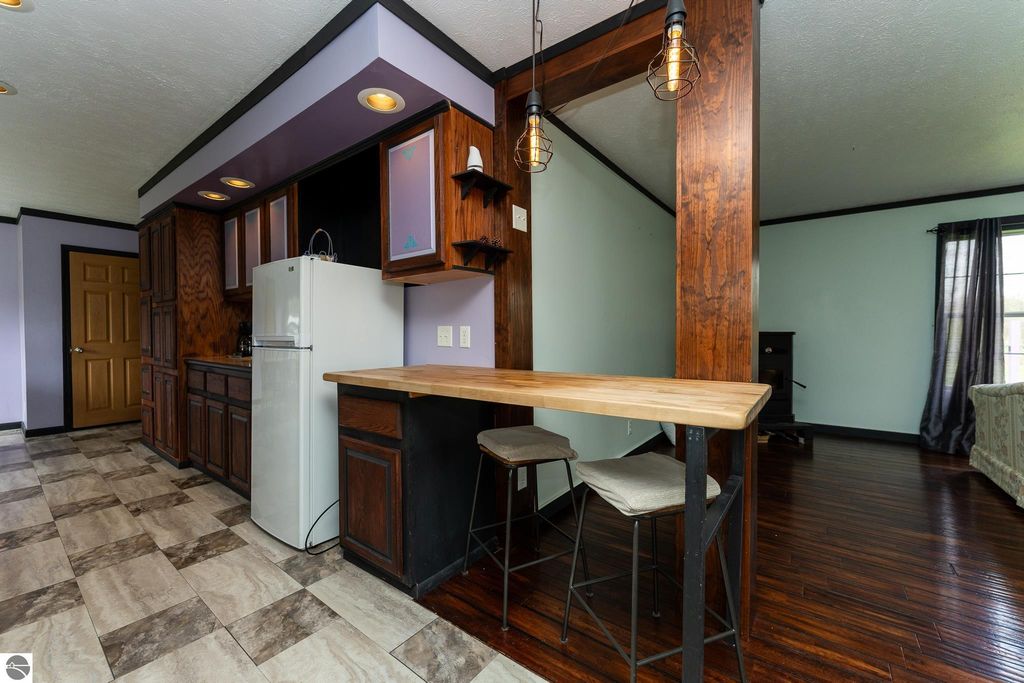 Image 25 of property listing at 464 N Rolland Road, Weidman, MI 48893