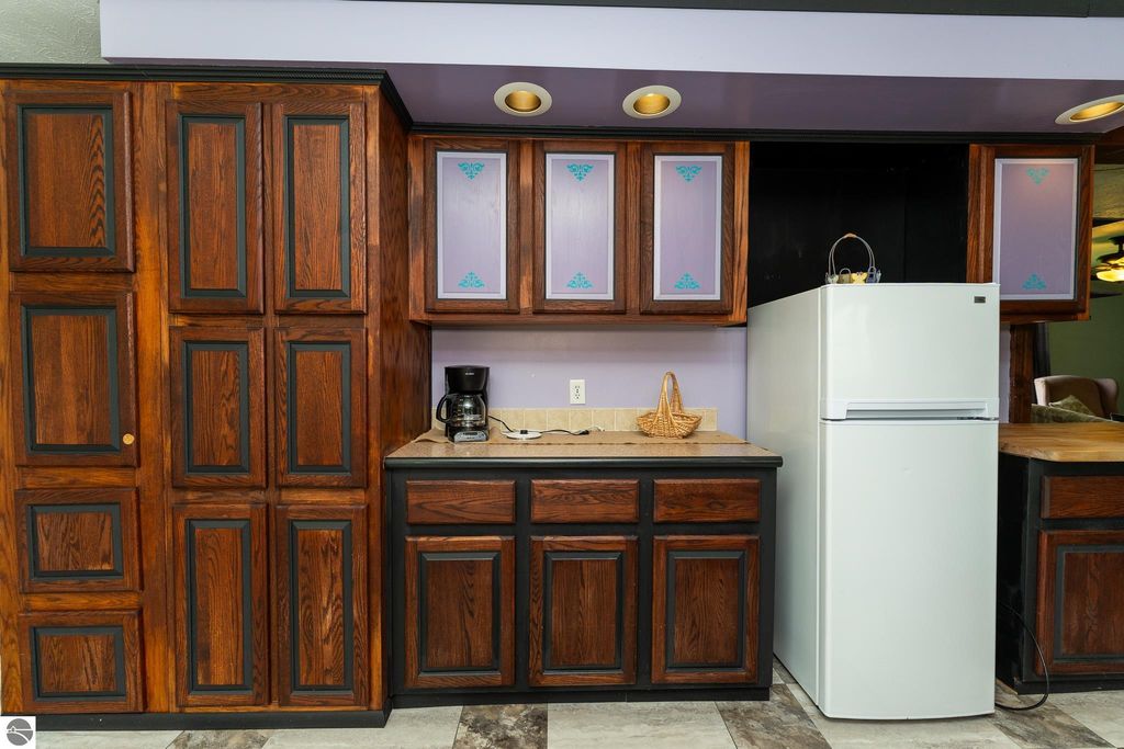 Image 27 of property listing at 464 N Rolland Road, Weidman, MI 48893