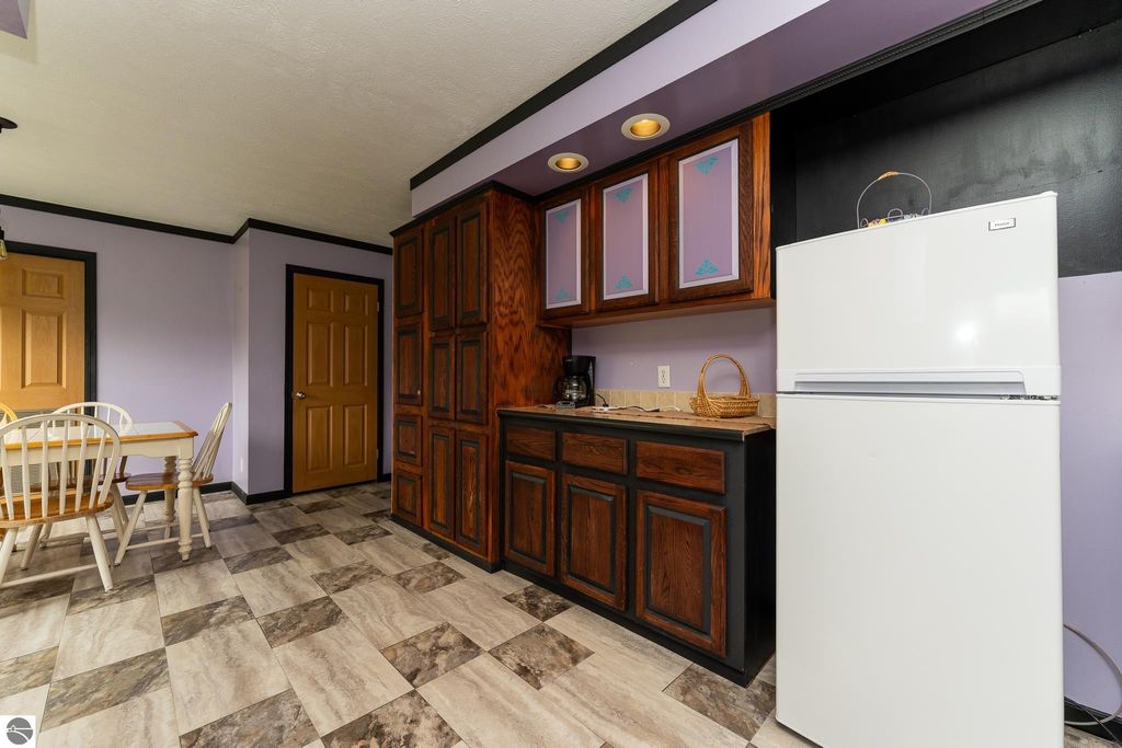 Image 28 of property listing at 464 N Rolland Road, Weidman, MI 48893
