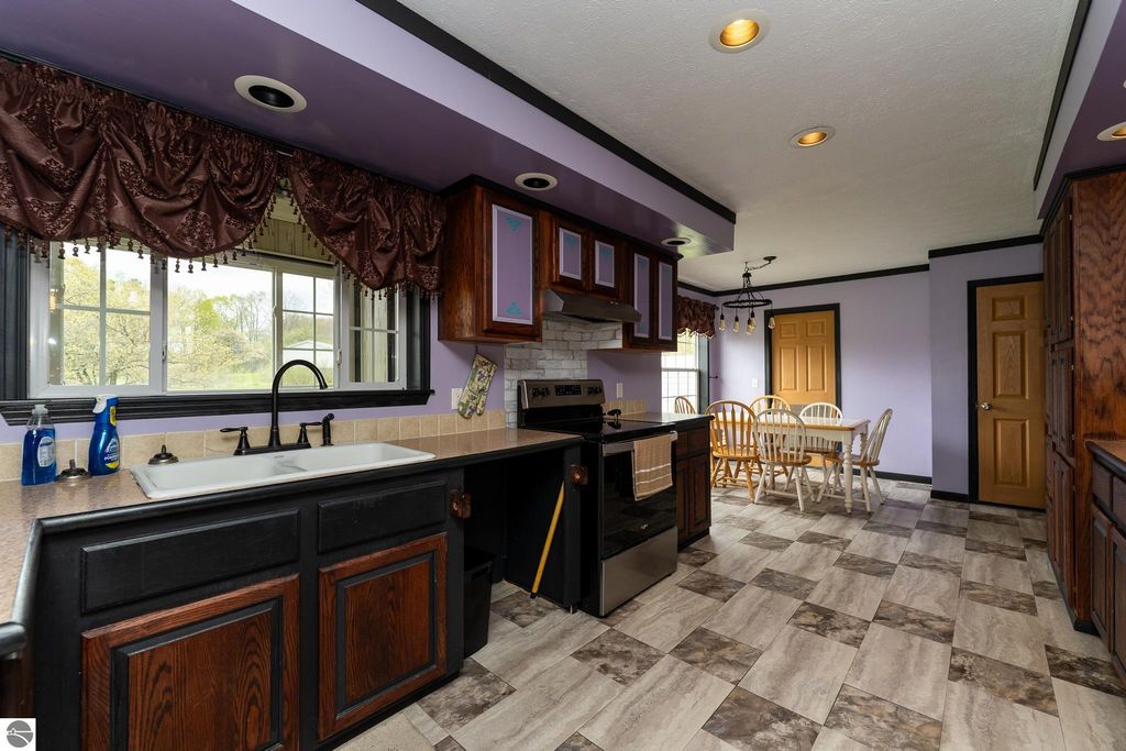 Image 29 of property listing at 464 N Rolland Road, Weidman, MI 48893