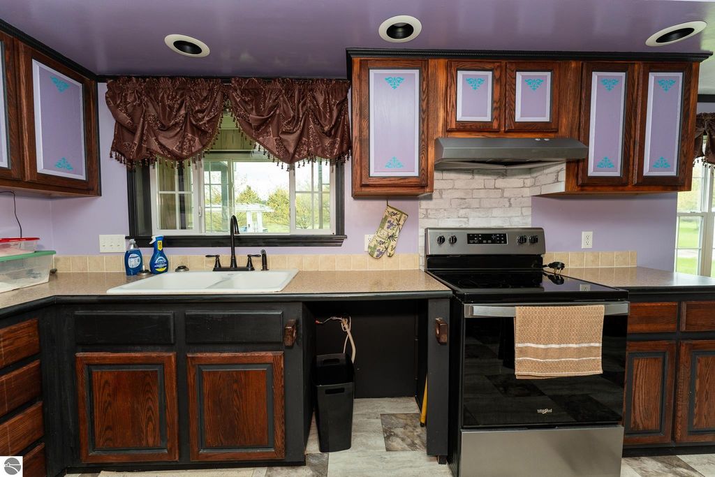 Image 30 of property listing at 464 N Rolland Road, Weidman, MI 48893