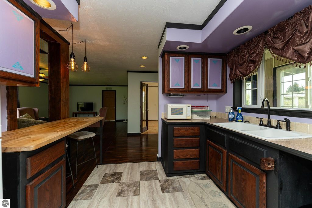 Image 31 of property listing at 464 N Rolland Road, Weidman, MI 48893