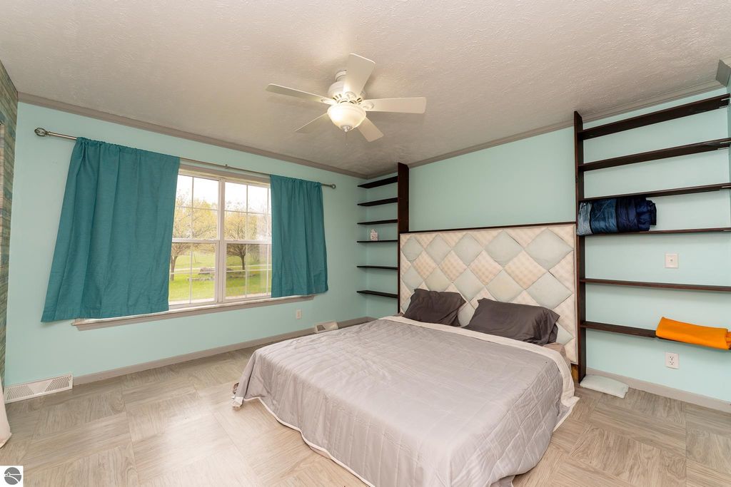 Image 35 of property listing at 464 N Rolland Road, Weidman, MI 48893