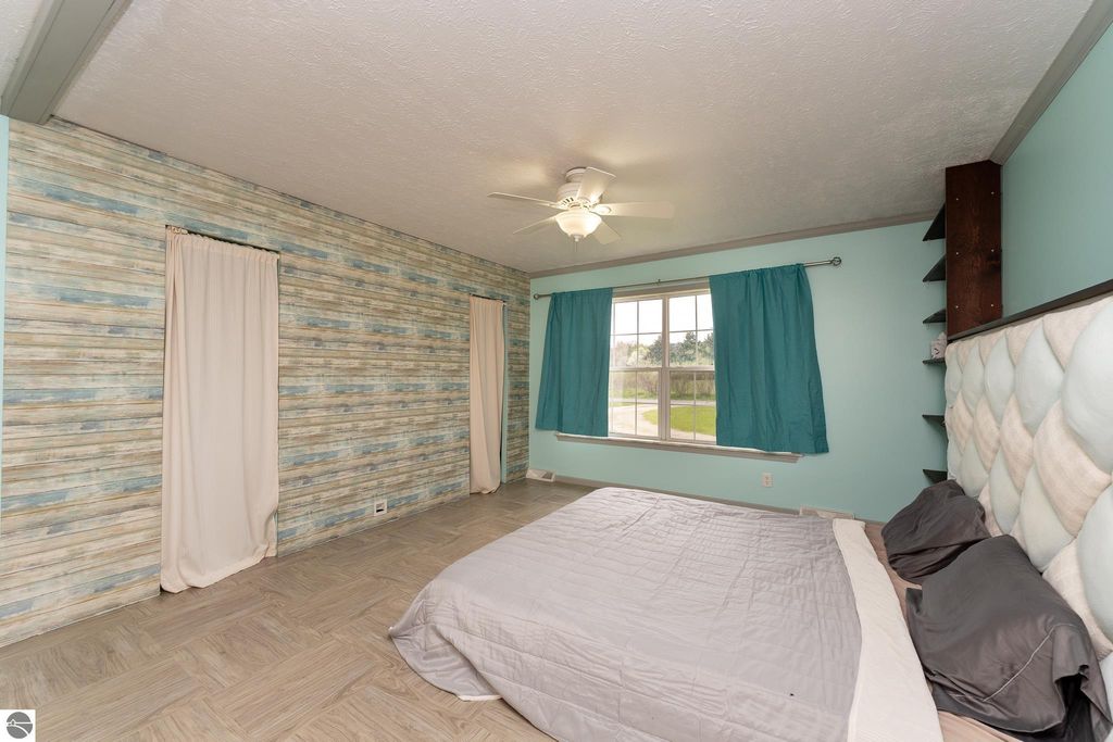 Image 36 of property listing at 464 N Rolland Road, Weidman, MI 48893
