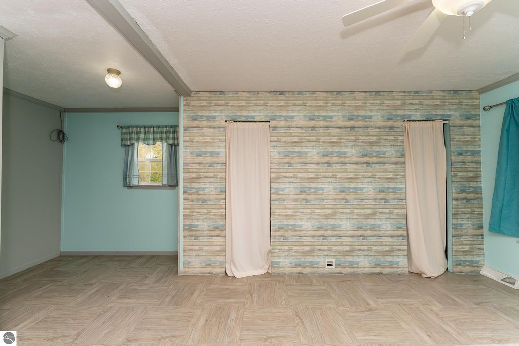 Image 38 of property listing at 464 N Rolland Road, Weidman, MI 48893