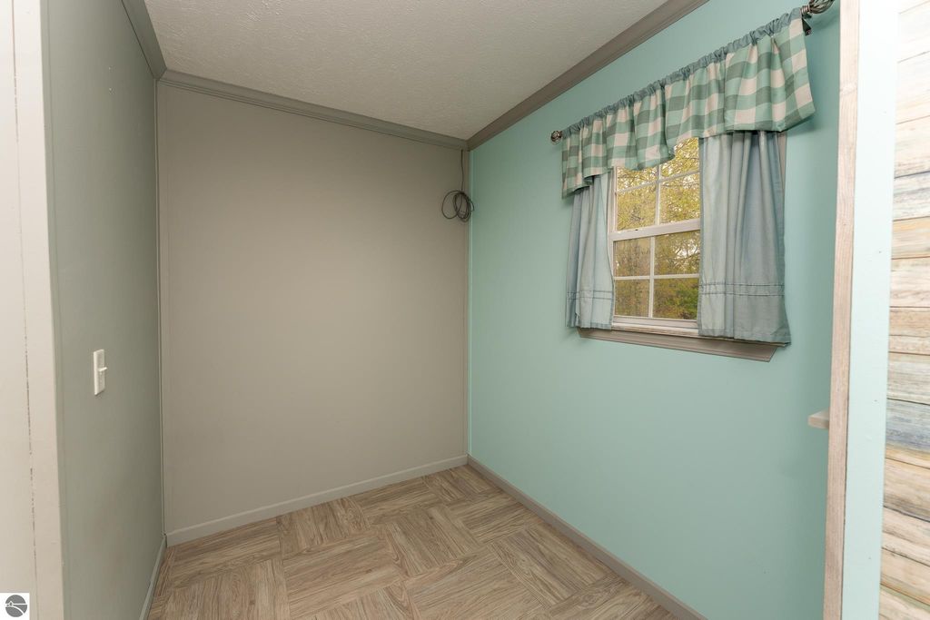 Image 39 of property listing at 464 N Rolland Road, Weidman, MI 48893