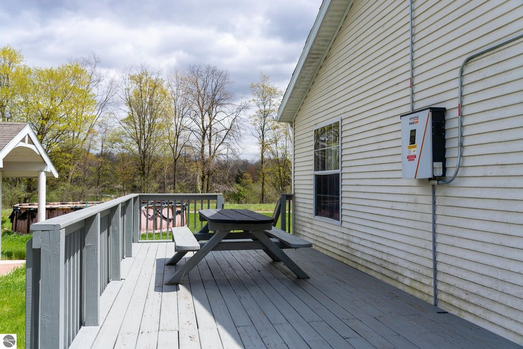 Image 6 of property listing at 464 N Rolland Road, Weidman, MI 48893