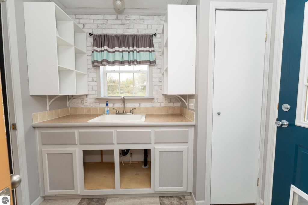 Image 54 of property listing at 464 N Rolland Road, Weidman, MI 48893