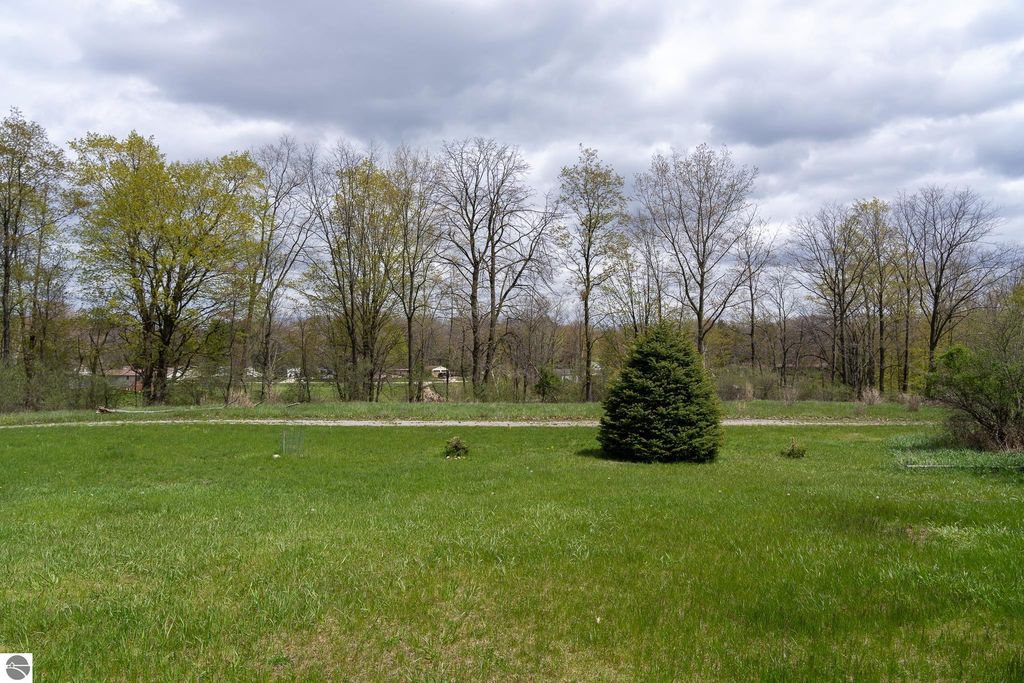 Image 61 of property listing at 464 N Rolland Road, Weidman, MI 48893