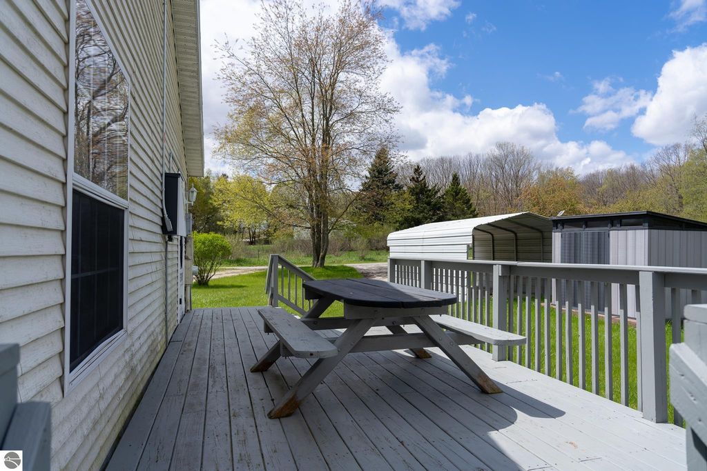 Image 7 of property listing at 464 N Rolland Road, Weidman, MI 48893