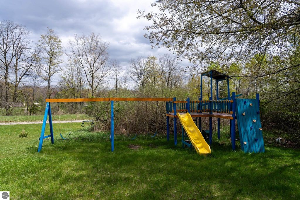Image 62 of property listing at 464 N Rolland Road, Weidman, MI 48893