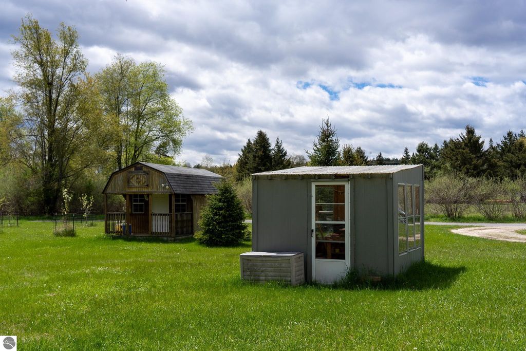 Image 64 of property listing at 464 N Rolland Road, Weidman, MI 48893
