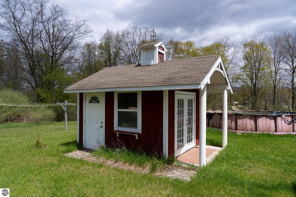 Image 67 of property listing at 464 N Rolland Road, Weidman, MI 48893