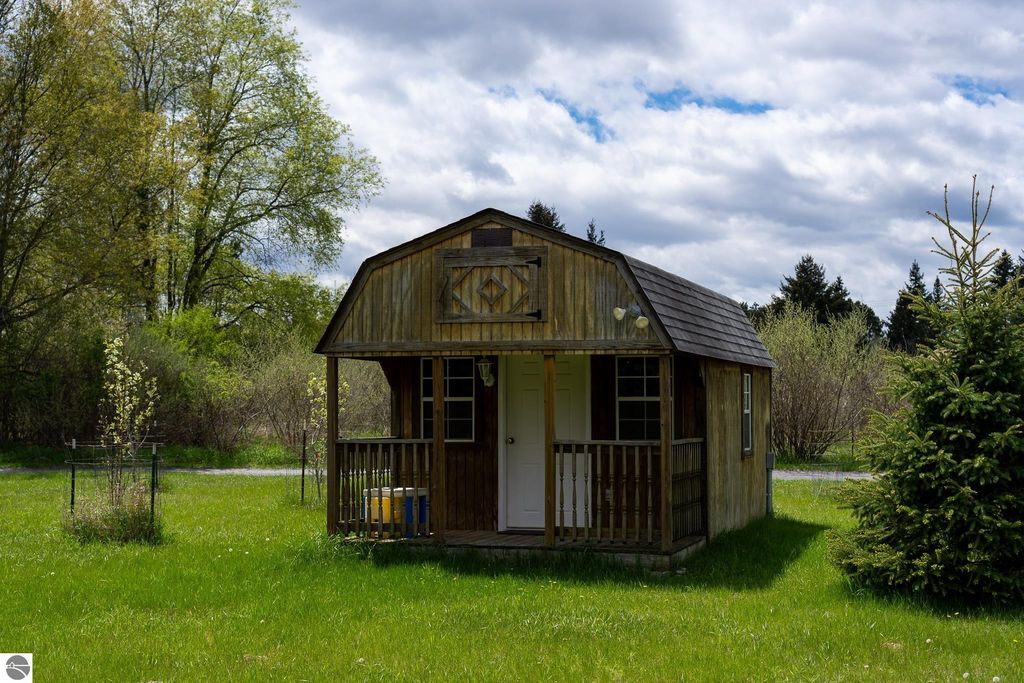 Image 68 of property listing at 464 N Rolland Road, Weidman, MI 48893