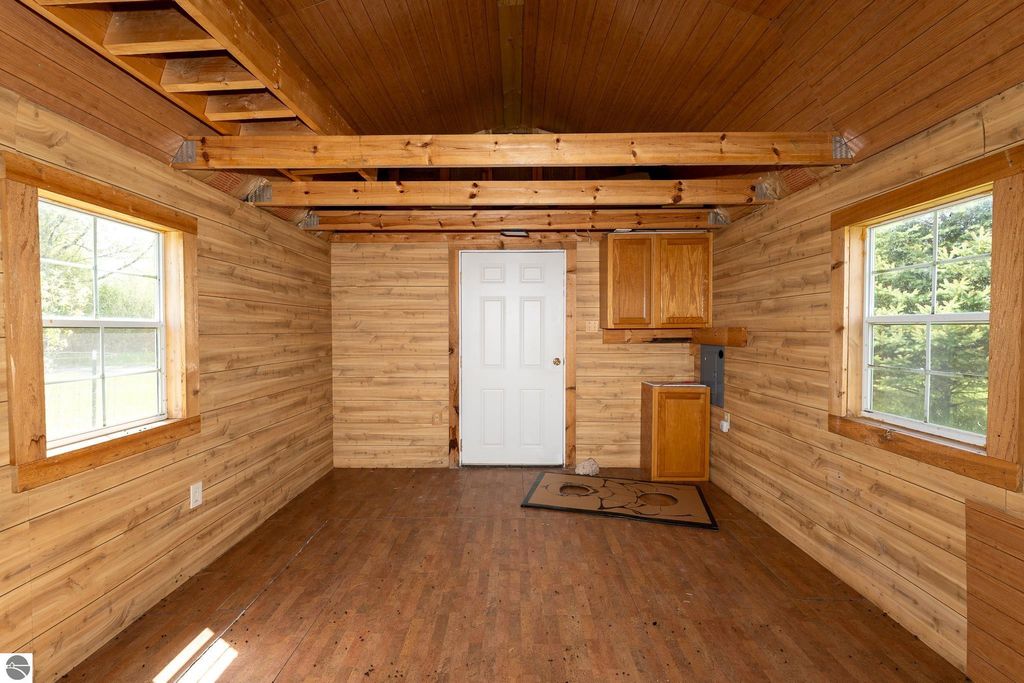 Image 70 of property listing at 464 N Rolland Road, Weidman, MI 48893