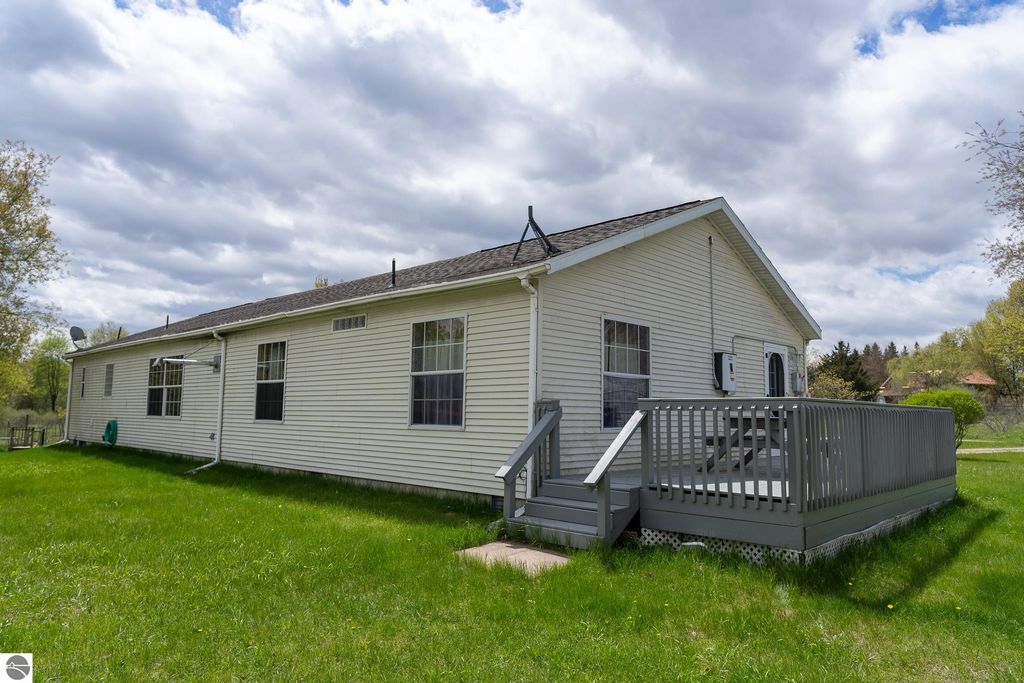 Image 9 of property listing at 464 N Rolland Road, Weidman, MI 48893