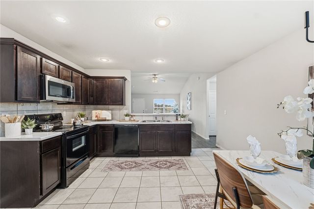 307 Woodcreek Street, Lowell, AR 72745